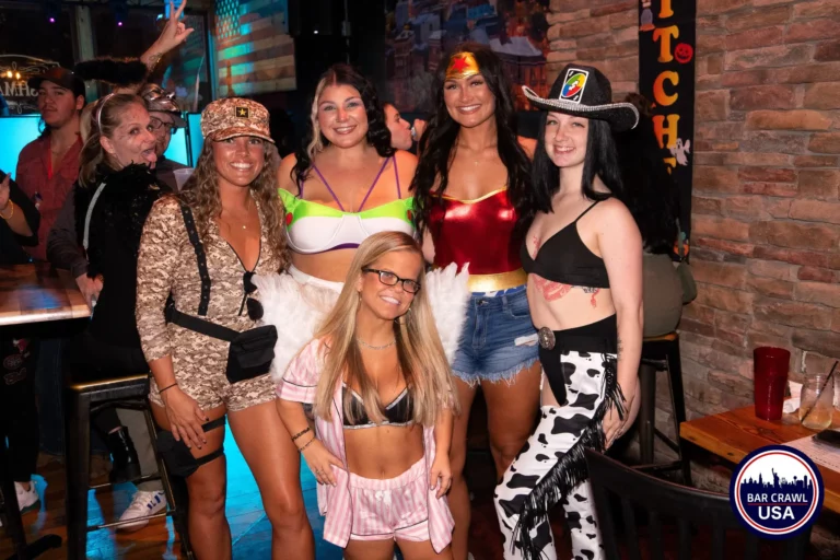 Group of costumed partygoers at a Bar Crawl USA Boos & Booze Halloween Bar Crawl